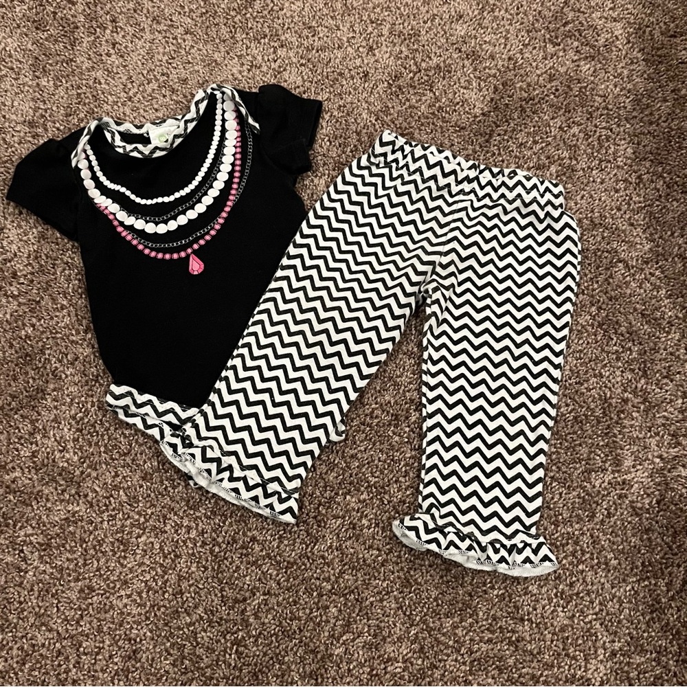 Black, White, Silver, and Pink Baby Gear Outfit